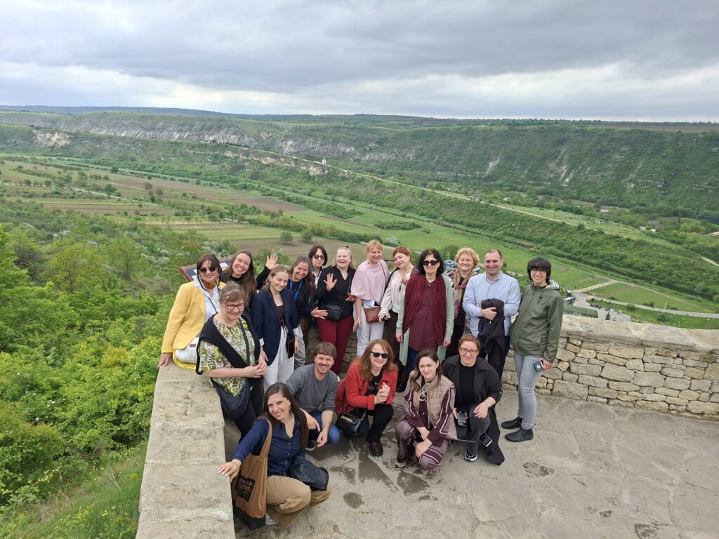 project team in group photo in the field trip