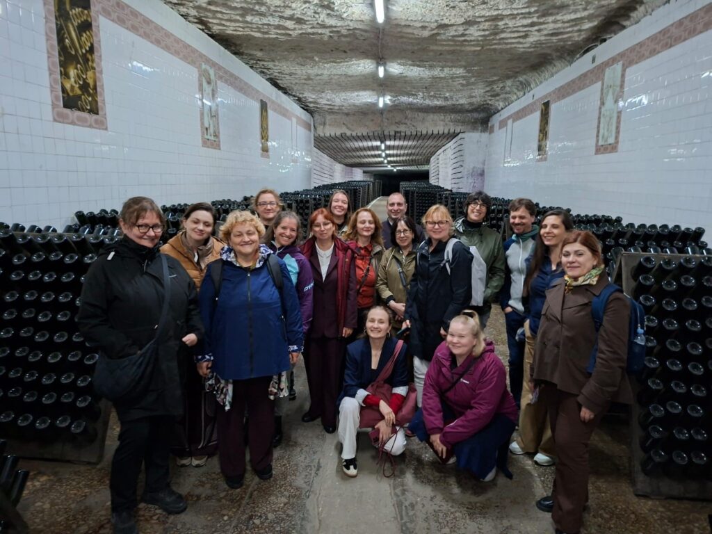 project team in group photo in the field trip