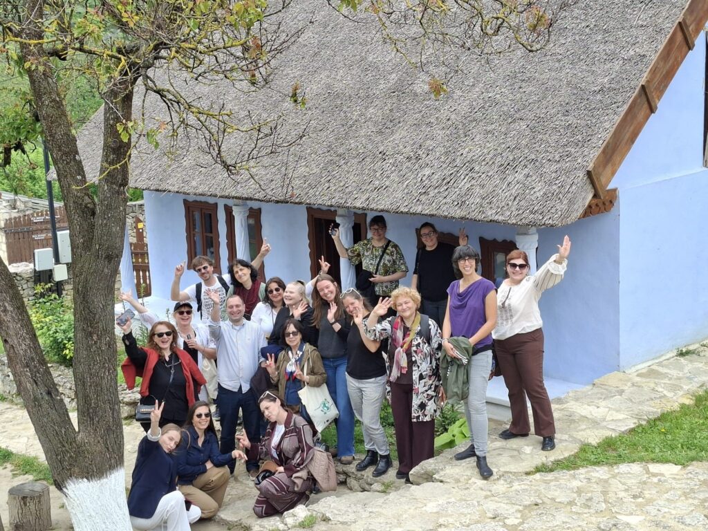 project team in group photo in the field trip